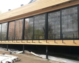 Остекление фасада раздвижными конструкциями