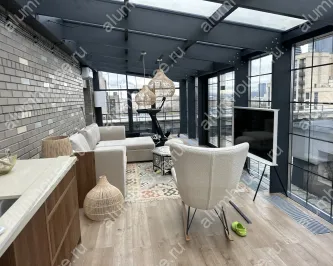 Зимний сад из алюминиевого профиля на крыше дома