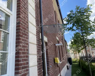 Козырек из стекла на вантах