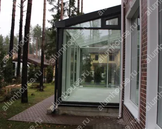 Стеклянная пристройка зимнего сада к дому