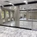 Превью - Безрамные раздвижные стеклянные перегородки в офисе