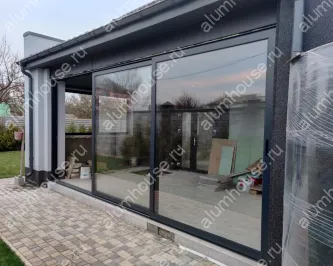 Остекление беседки теплыми раздвижными дверьми