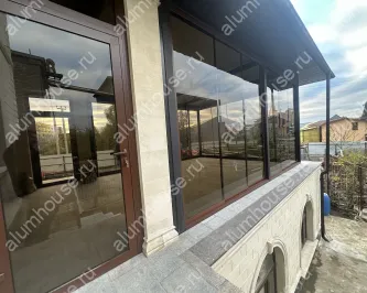 Базрамное слайдинговое остекление с тонированным стеклом "Бронза"