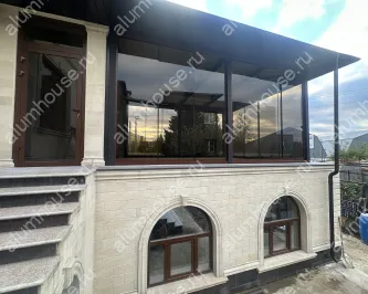 Базрамное слайдинговое остекление с тонированным стеклом "Бронза"