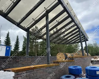 Стеклянный навес на спайдерном креплении из нержавеющей стали