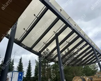 Стеклянный навес на спайдерном креплении из нержавеющей стали