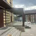 Превью - Стеклянная веранда к дому с раздвижным безрамным остеклением