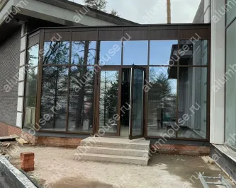 Зимний сад из алюминия с декорацией профиля под фактуру дерева