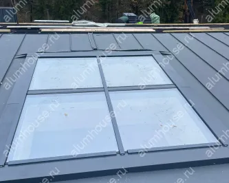 Устройство зенитных фонарей из алюминиевого профиля на крыше частного дома