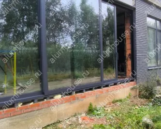 Подъемно-раздвижные двери на веранду с тремя створками Alumil S700