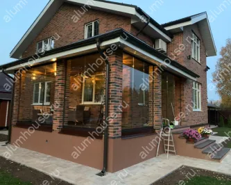 Веранда с раздвижным холодным панорамным остеклением