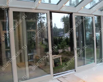 Стеклянная пристройка зимнего сада к дому