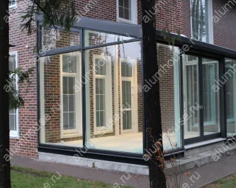 Стеклянная пристройка зимнего сада к дому