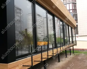 Остекление фасада раздвижными конструкциями