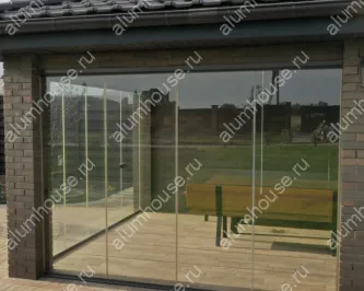 Беседка с безрамным остеклением и зоной барбекю