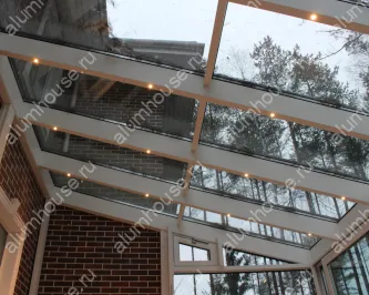 Стеклянная пристройка зимнего сада к дому