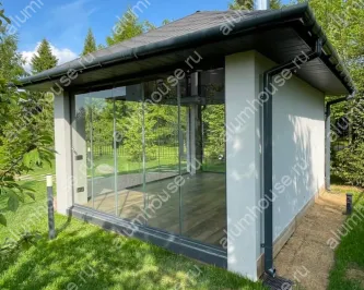 Четырехгранная беседка с безрамным остеклением Claroflex и Slide
