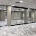 Превью - Безрамные раздвижные стеклянные перегородки в офисе