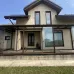 Превью - Веранда к дому со стеклянной крышей и безрамным остеклением