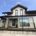 Превью - Веранда к дому со стеклянной крышей и безрамным остеклением