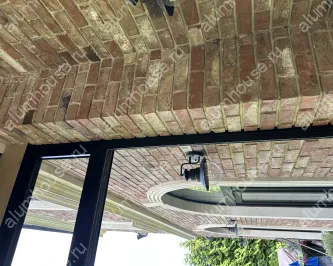 Легкое остекление террасы раздвижными конструкциями слайдер