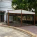 Превью - Отдельностоящая тентовая пергола с безрамным остеклением