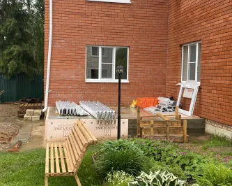 Зимний сад из алюминия пристроенный к углу дома