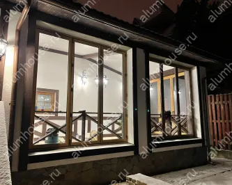 Остекление веранды алюминиевой входной группой и складными окнами гармошка