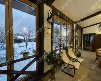 Остекление веранды алюминиевой входной группой и складными окнами гармошка